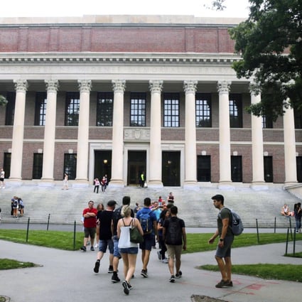 Students walk near the Widener Library at Harvard University in Cambridge, Massachusetts, in the United States. Photo: AP