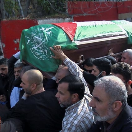 Men carry the coffin of a man who was killed in an explosion in the Palestinian camp of Burj al-Shemali, during his funeral in Tyre, Lebanon on Sunday. Photo: Reuters 