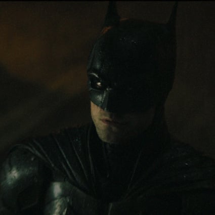 Robert Pattinson as the Caped Crusader in a still from The Batman, one of 15 of the best new Hollywood films to watch this winter.