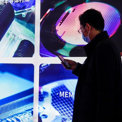 A man visits a booth at SEMICON China, in Shanghai, March 17, 2021. The semiconductor industry has taken centre stage in tech rivalry between China and the US. Photo: Reuters