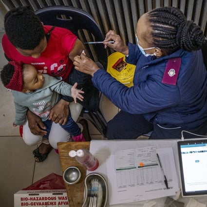 A woman gets vaccinated against Covid-19 in Johannesburg, South Africa. Photo: AP