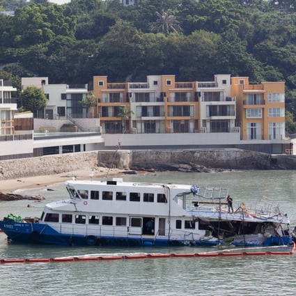 The damaged Lamma IV is moored off Lamma Island in Hong Kong after the  October 2012 collision that killed 38 people. Photo: EPA