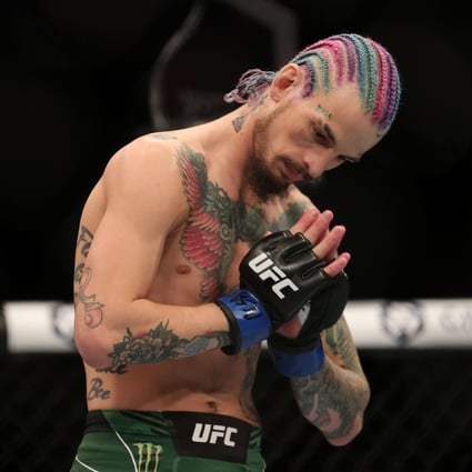 Sean O’Malley reacts after beating Raulian Paiva of Brazil at UFC 269. Photo: Carmen Mandato/Getty Images/AFP