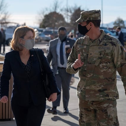 US deputy defence secretary Kathleen Hicks speaks with Brigadier General Todd Moore, deputy commander of Space Training and Readiness Command, during a trip to Schriever Space Force Base in Colorado on Monday. Photo: Reuters 