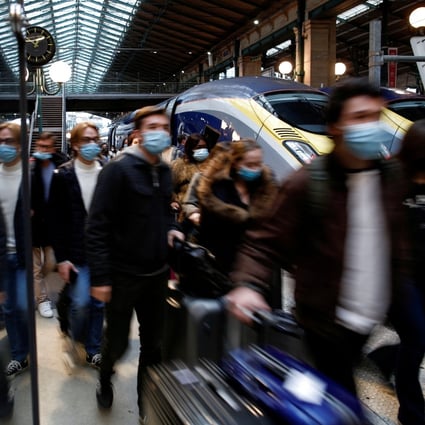 Passengers at the Gare du Nord train station in France where 110,000 fake health passes are in circulation. Photo: Reuters