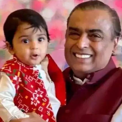 Billionaire Mukesh Ambani with his grandson, Prithvi Akash Ambani, who turned one on December 10, an occasion marked with a lavish party. Photo: @lokpatrika/Instagram