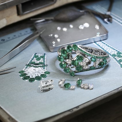 Assembling a Graff emerald and diamond secret watch, a form of jewellery long favoured by women who didn’t want to draw attention to the fact they were wearing a timepiece. Photo: Graff
