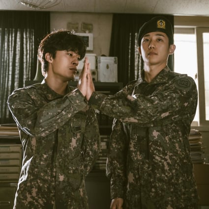 Koo Kyo-hwan (left) and Jung Hae-in in a still from D.P., which has been renewed for a second season. Production companies are nailing down casts for Korean drama series that will broadcast in 2022. Photo: Netflix