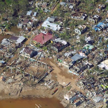 An aerial view of a village in Surigao City, southern Philippines after the typhoon. Photo:  Philippine Coast Guard 