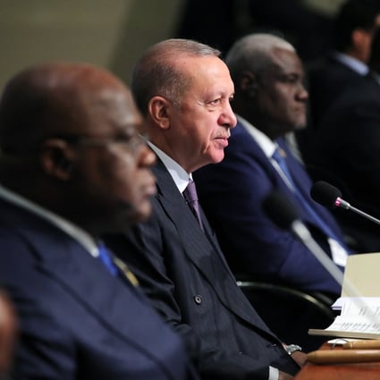 Turkish President Recep Tayyip Erdogan (C) gives a speech at the opening session of the 3rd Turkey-Africa Partnership Summit in Istanbul on December 18. Photo: Turkish Presidential Press Service via AFP
