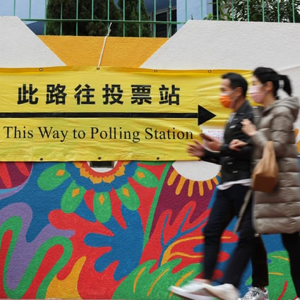 A polling station banner steers voters in Whampoa. Photo: Felix Wong