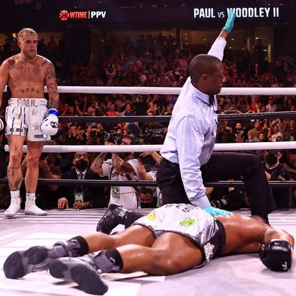 Jake Paul reacts to knocking out Tyron Woddley in the sixth round during in Tampa, Florida.Photo: Mike Ehrmann/Getty Images/AFP