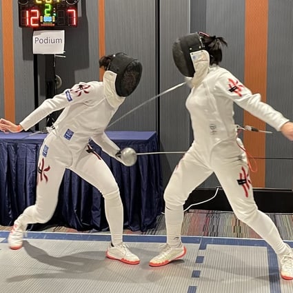 Vivian Kong (left) and Debbie Ho in the Hong Kong Challenge women’s epee final at the Science Park. Photo: Chan Kin-wa   