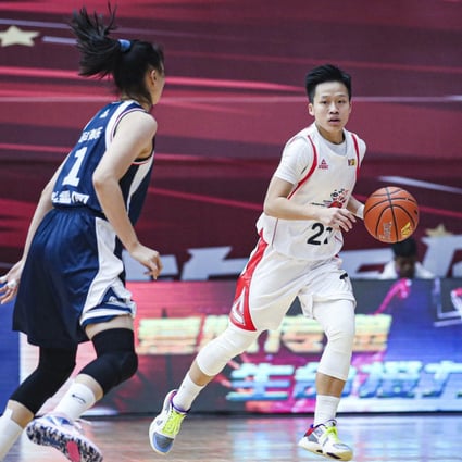 Li Tsz-kwan (right), the city’s first and only female professional basketball player, in action in a WCBA game. Photo: Osports
