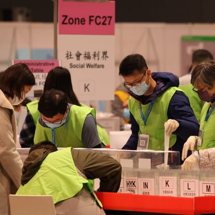 Votes being counted at the Hong Kong Convention and Exhibition Centre in Wan Chai. Photo: Nora Tam