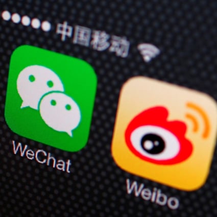Icons for the WeChat and Weibo apps seen on a smartphone on December 5, 2013. Social media platforms have been hit with clean-up campaigns and rectification measures that have taken a toll on the market this year. Photo: Reuters