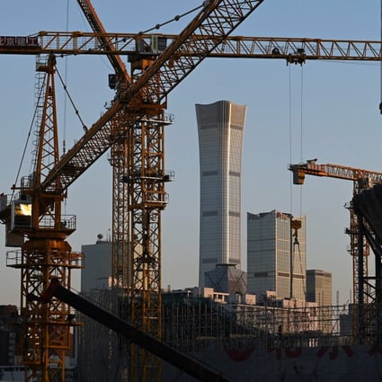 A construction site in Beijing. The People’s Bank of China and the China Banking and Insurance Regulatory Commission are encouraging banks to provide loan services for the acquisition of quality property projects by quality developers. Photo: AFP