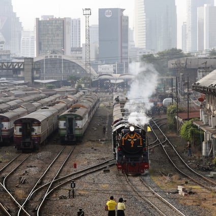 A century-old steam locomotive leaves for Ayutthaya from Bangkok’s Hua Lamphong railway station earlier this month. Photo: EPA