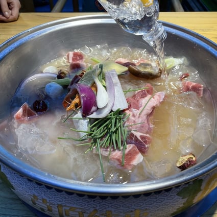 Lamb hotpot is a popular dish in northern China during the winter months. At Caoyuan Wangshi, a Mongolian specialist lamb hotpot chain, diced lamb cubes are served with ice to keep the meat fresh. Photo: Elaine Yau
