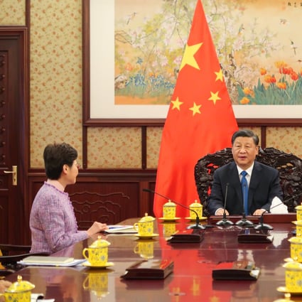 Carrie Lam meets President Xi Jinping in Beijing on Wednesday. Photo: Pool