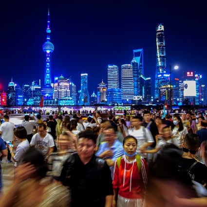 People walk along the Bund in Shanghai. China’s financial capital has been keen on developing its technology sector over the past few years. Photo: Reuters