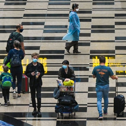 Travellers walk through the transit hall at Changi International Airport in Singapore. Photo: AFP