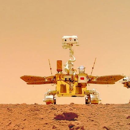 The Zhu Rong Mars Rover, pictured next to the landing platform, on the surface of the red planet.
Photo: EPA-EFE