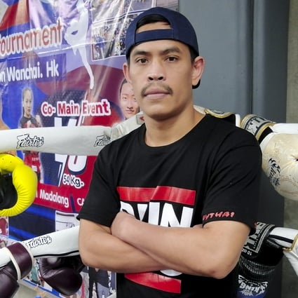 Muay Thai trainer Thep is giving domestic helpers the chance to train, socialise and shrug off the stresses that have kept many away from their families for more than two years. Photo: SCMP