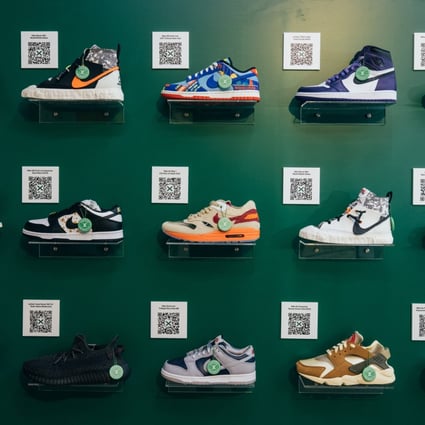 Sneakers on display at a StockX pop-up store in Hong Kong. Sports shoes set a new price record, prompted lawsuits and were worn by an Oscar winner to the Academy Awards in 2021.