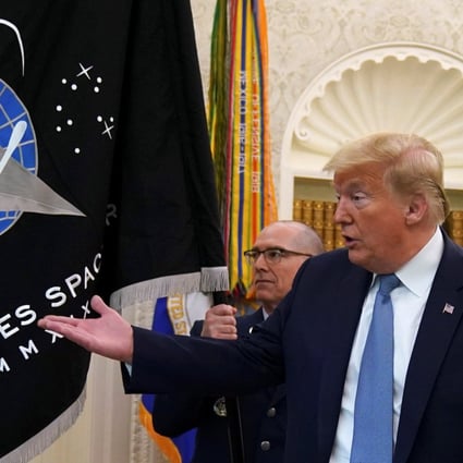 Donald Trump signed the law establishing space force two years ago. Photo: Reuters