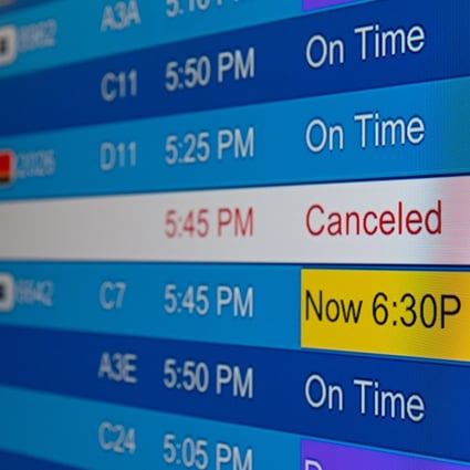 Cancelled flights on an electronic board at Washington Dulles International Airport, Virginia, US. Photo: Bloomberg