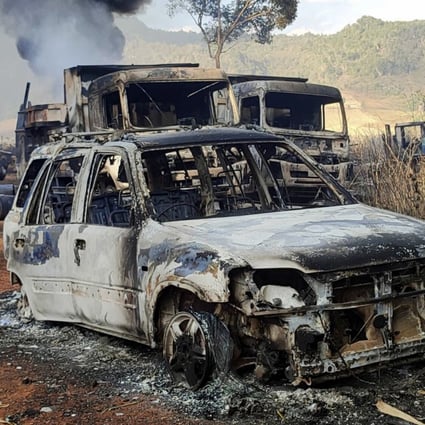 Vehicles smoulder in Kayah state, Myanmar, where women and children, were shot dead. Photo: AP