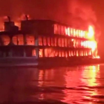 The  MV Avijan-10 was carrying 800 passengers when it caught fire in Jhakakathi, 250km south of Dhaka, early on Friday. Photo: AFPTV/AFP