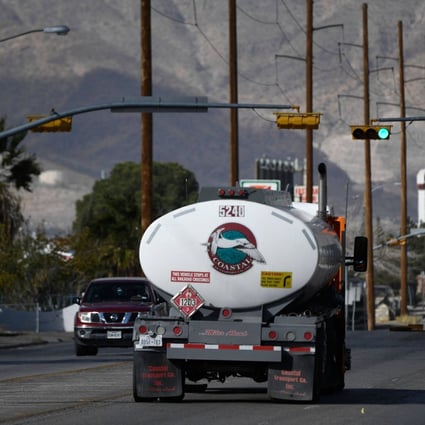Gasoline tanker trucks drive down a road near the Marathon Petroleum Corp in El Paso Texas. The refinery has a crude oil refinery capacity of approximately 131,000 barrels per calendar day. Photo: AFP