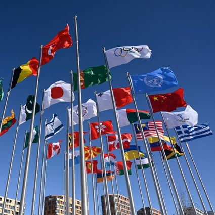 Flags fly at the Beijing 2022 Winter Olympic Games village. Photo: AFP