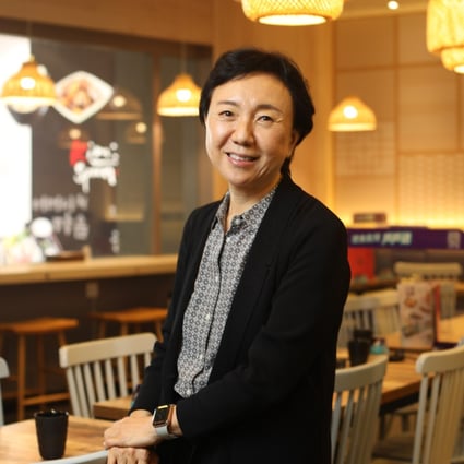 Milie Kim of Kim’s Spoon at her restaurant in Kowloon Bay – one of 19 she owns in Hong Kong. After running her mother’s Korean restaurant Lee Fa Yuen, she launched Korean fast food in the city in the 1990s. Photo: Xiaomei Chen