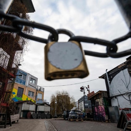 A locked gate blocks access to the Holzmarkt 25 bar area on the banks of the river Spree in Berlin on Monday. Photo: AFP