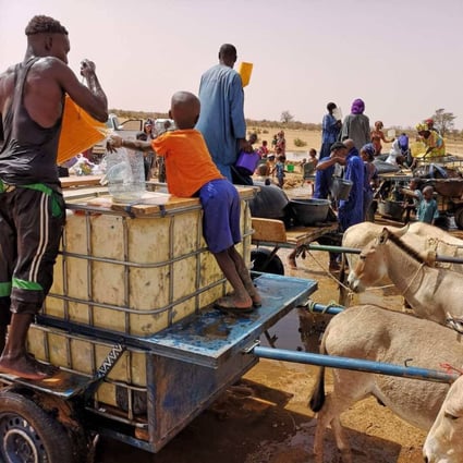 People collect water from a China-funded well in a village in Senegal in August 2018. The well-drilling project was one outcome from the Forum on China-Africa Cooperation summit in 2015. The competition for influence is an opportunity for Africa to fast-track its development. Photo: Xinhua