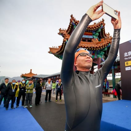Zhang Heng, 51, participated in a triathlon organised by his company Sanfo at Jinhai Lake in Beijing in 2021. He founded the outdoor sports equipment company 25 years ago. 