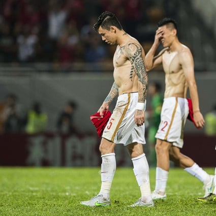 The ban will affect a number of Chinese players, including Guangzhou FC defender Zhang Linpeng (left). Photo: EPA