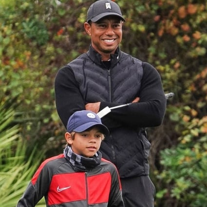 Tiger Woods and his mini-me son, Charlie. Photo: @charliewoods_fanclubpage/Instagram