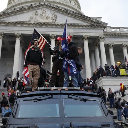 Supporters of US president Donald Trump riot at the US Capitol building in Washington on January 6. Multiple reports have detailed the trend of democratic backsliding and the rise of more authoritarian governance. Photo: TNS