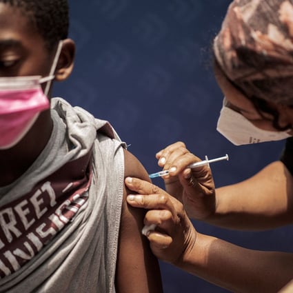 A boy receives a dose of the Pfizer-BioNTech vaccine at the Discovery vaccination site in Sandton, Johannesburg, on December 15. Photo: TNS