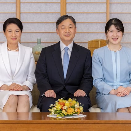 Japan’s Emperor Naruhito, Empress Masako, left, and their daughter Princess Aiko pose for a photo during a family portrait session ahead of the New Year. Photo: AP