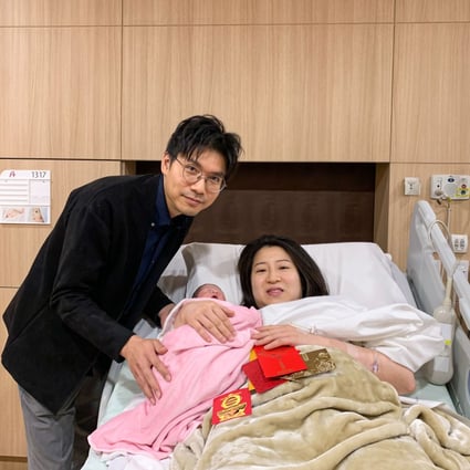 Li and his wife with their newborn daughter Gilly at the Hong Kong Adventist Hospital – Tsuen Wan.  Photo: Handout