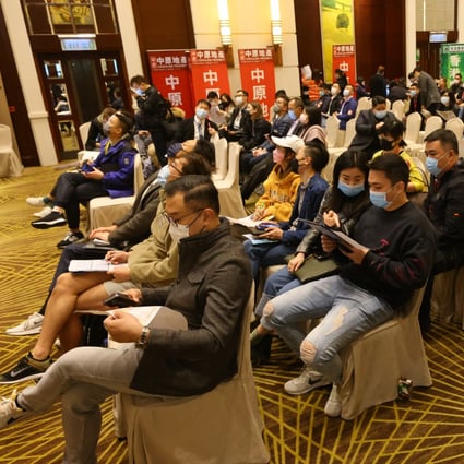 Prospective homebuyers await the start of sale at Chun Wo Development Holdings’ Soyo project in Mong Kok on January 2, 2022. Photo: Dickson Lee