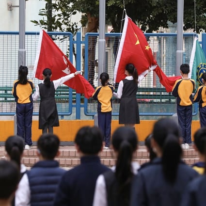 Flag-raising ceremony at Buddhist Lim Kim Tian Memorial Primary School in Kwai Fong. Photo: Jonathan Wong