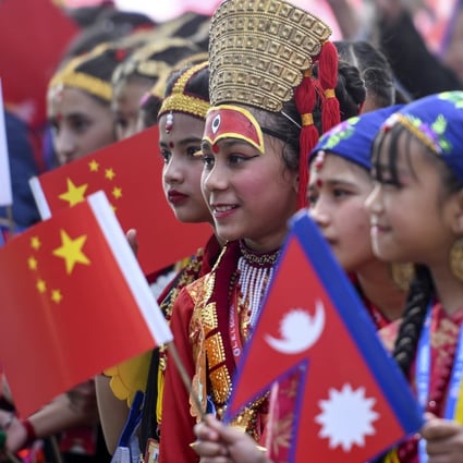Nepali children wearing traditional clothes at Tribhuvan International Airport bid farewell to China’s President Xi Jinping after his two-day visit in 2019. Photo: EPA