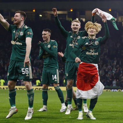 Celtic player Kyogo Furuhashi of Japan celebrates with his teammates after winning the Scottish League Cup final against hibernian at Hampden Park in Glasgow. Photo: Reuters   