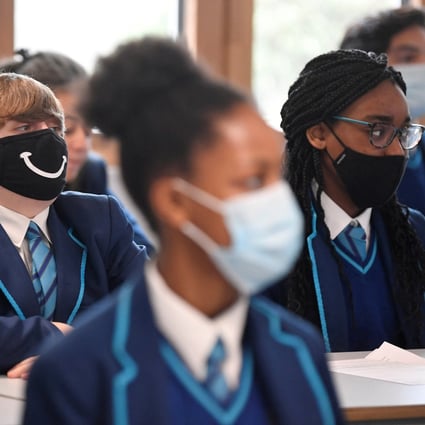 School pupils wear protective face masks at Harris Academy Sutton, London. Photo: Reuters